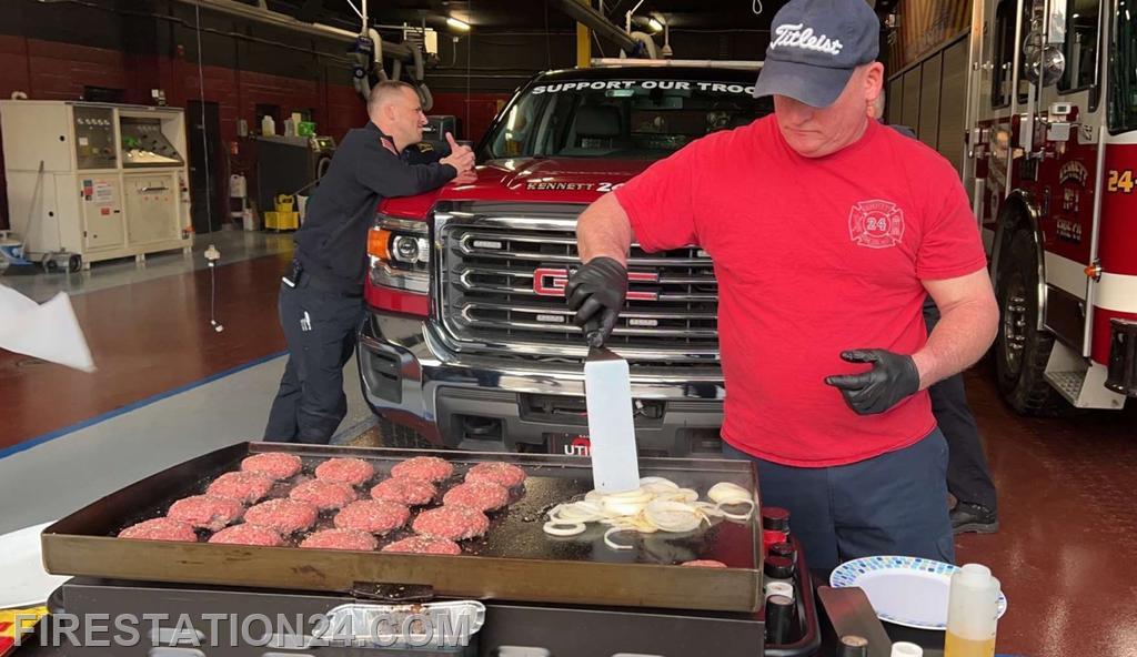 Kennett's Deputy Chief Melton cooking burgers for the 24 and 25 duty crews.